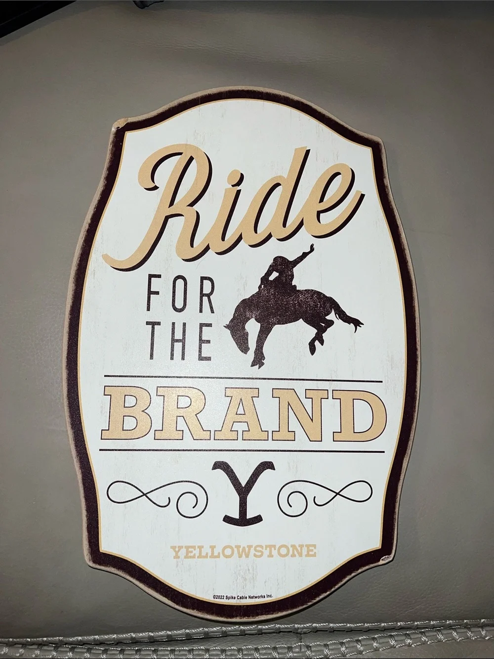 Yellowstone 'Ride for the Brand' Wall Sign in White and Tan